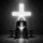 A glowing cross standing in darkness, lit from behind.